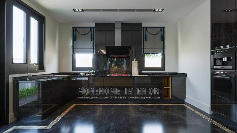 Mẫu tủ bếp biệt thự này được phân chia thành hai phần công năng tách biệt đó là: phần khu vực đặt bếp điện từ (khu vực nóng) và khu vực bồn chậu rửa chế biến thực phẩm.